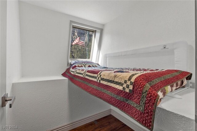 bedroom featuring hardwood / wood-style flooring