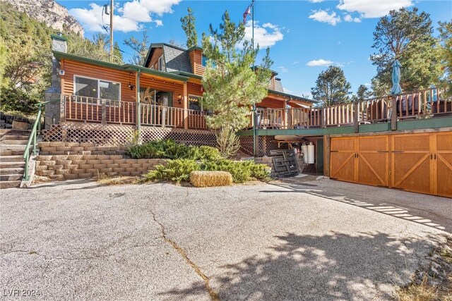 view of log cabin