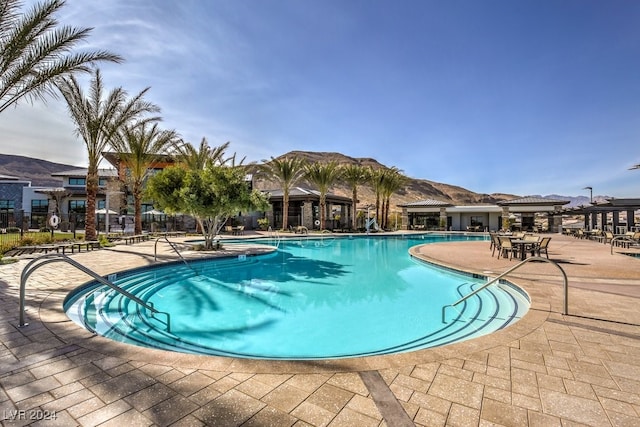 view of pool featuring a patio