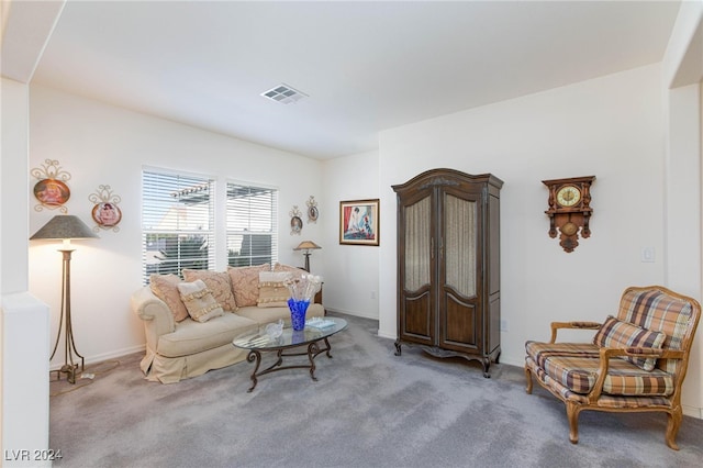 living room featuring light colored carpet