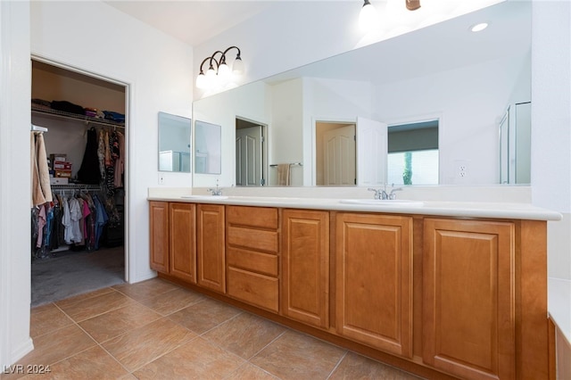 bathroom with vanity and tile patterned floors