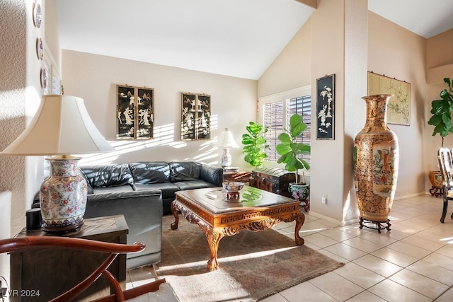 tiled living room with high vaulted ceiling