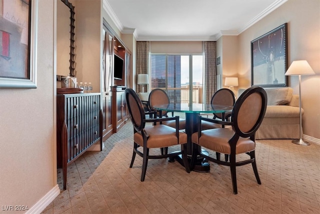 dining room featuring ornamental molding