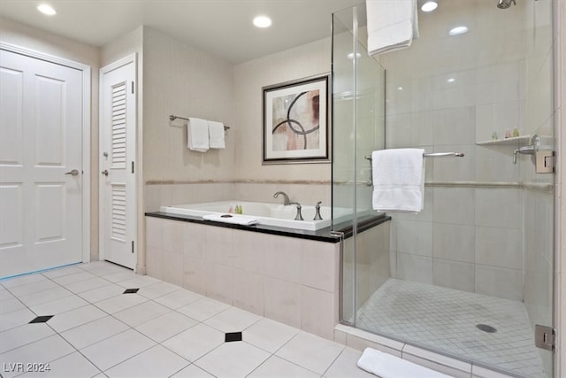 bathroom with tile patterned flooring and plus walk in shower