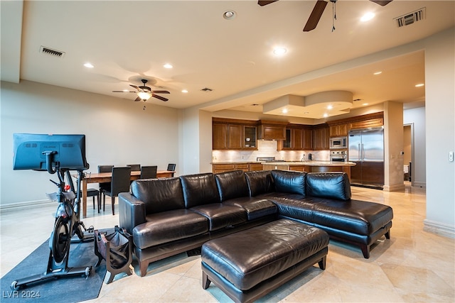 living room with ceiling fan