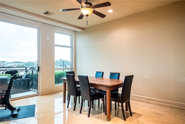 dining room with ceiling fan