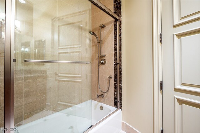 bathroom featuring enclosed tub / shower combo