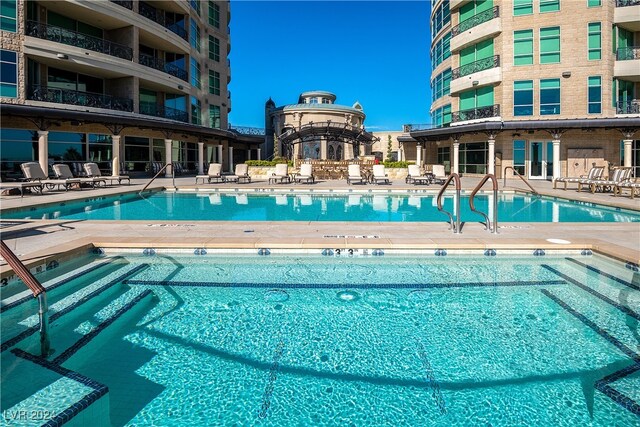 view of swimming pool featuring a patio