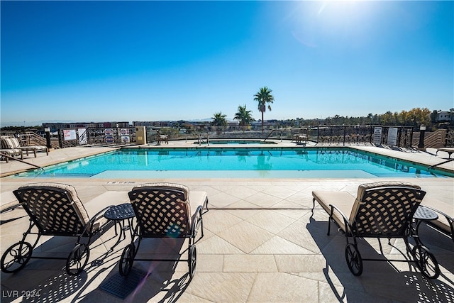 view of pool featuring a patio area