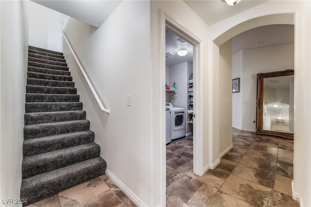 stairway featuring washer / clothes dryer