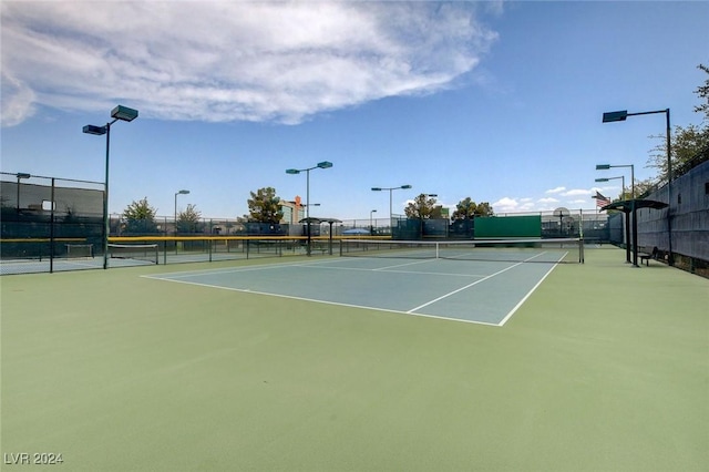 7457 Widewing Dr, North Las Vegas, NV 89084 - view of tennis court featuring fence