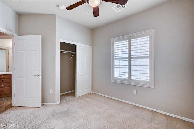 7457 Widewing Dr, North Las Vegas, NV 89084 - unfurnished bedroom with carpet, a closet, baseboards, and ceiling fan