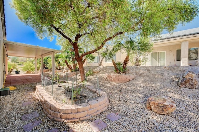 7457 Widewing Dr, North Las Vegas, NV 89084 - view of yard with a patio area