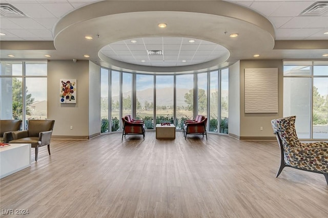 7457 Widewing Dr, North Las Vegas, NV 89084 - community lobby featuring a mountain view, a wall of windows, and recessed lighting