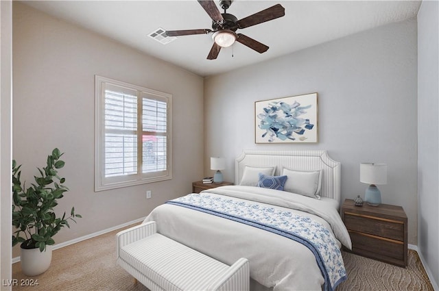 7457 Widewing Dr, North Las Vegas, NV 89084 - carpeted bedroom featuring baseboards and a ceiling fan