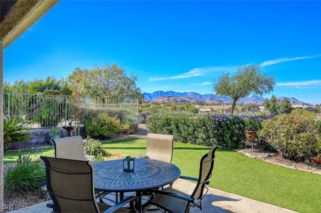 view of patio / terrace with a mountain view