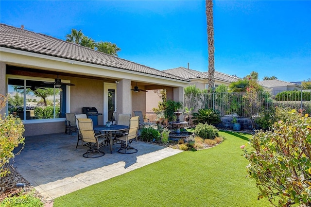 view of patio with ceiling fan