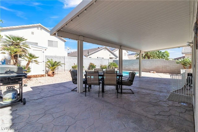 view of patio with a grill