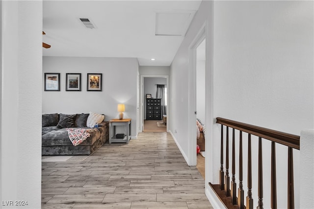 hallway featuring light hardwood / wood-style flooring