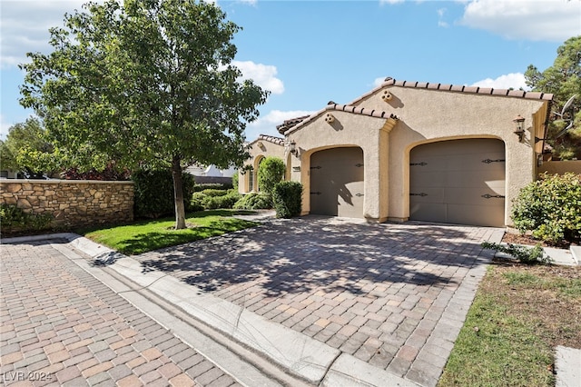 view of front of house with a garage