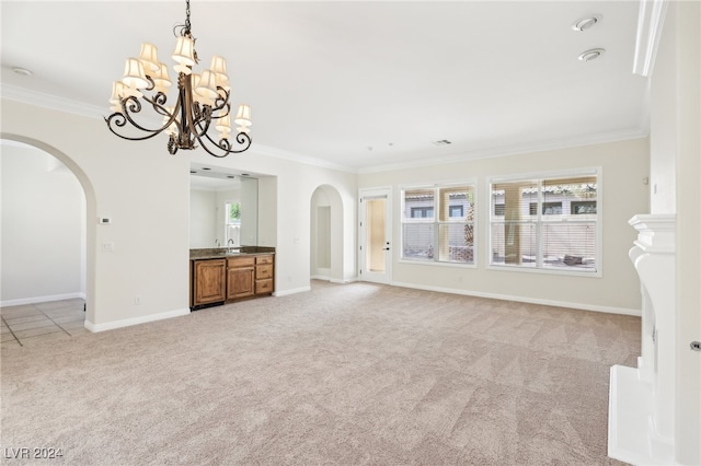 unfurnished living room featuring ornamental molding and light carpet