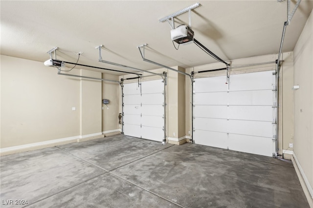 garage featuring a garage door opener