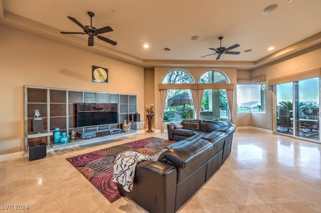 living room featuring ceiling fan