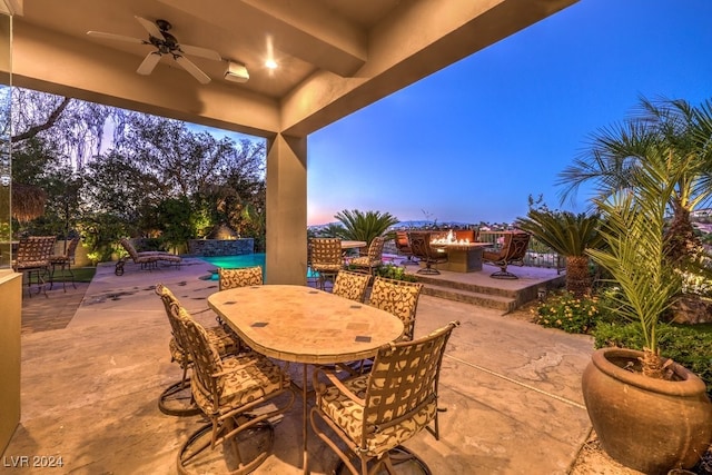 patio terrace at dusk with ceiling fan