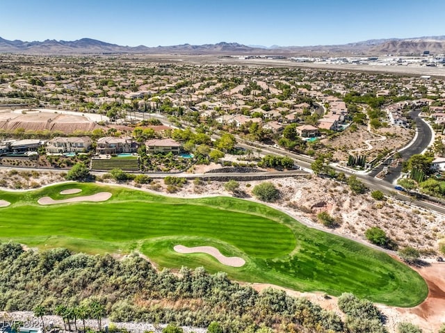 birds eye view of property featuring a mountain view