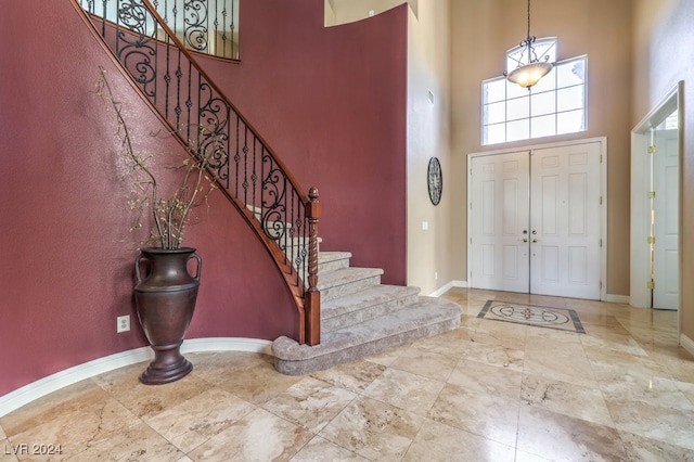 foyer with a high ceiling