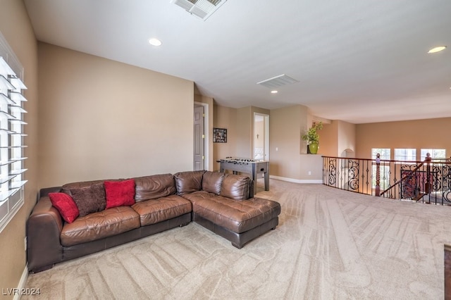 living room with light colored carpet