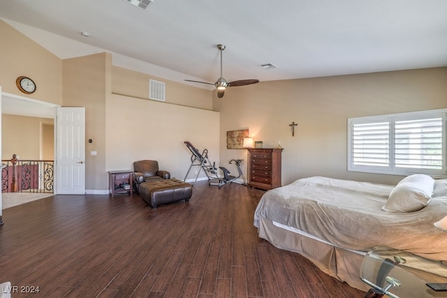 bedroom featuring lofted ceiling, ceiling fan, and dark wood-type flooring