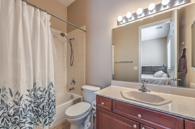 full bathroom featuring vanity, toilet, and shower / tub combo with curtain