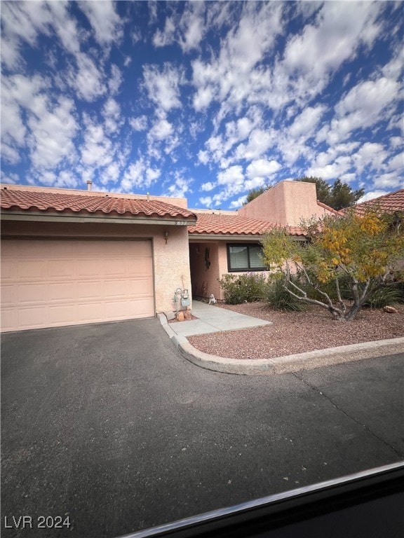 view of front of property with a garage