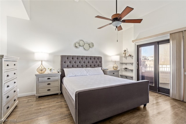 bedroom featuring access to outside, high vaulted ceiling, hardwood / wood-style floors, and ceiling fan