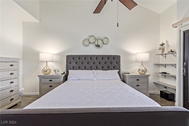 bedroom with lofted ceiling, ceiling fan, and dark wood-type flooring