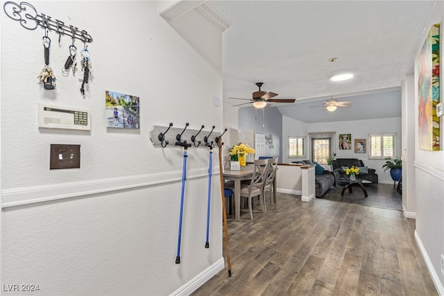 interior space featuring ceiling fan, lofted ceiling, and hardwood / wood-style floors