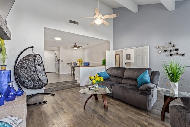 living room featuring beam ceiling, high vaulted ceiling, ceiling fan, and dark hardwood / wood-style flooring