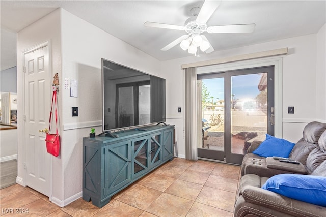 interior space with ceiling fan and light tile patterned floors