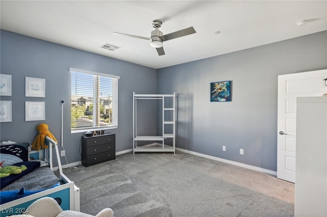 bedroom featuring ceiling fan and carpet floors