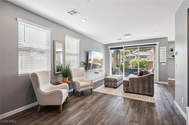 living room with dark hardwood / wood-style floors