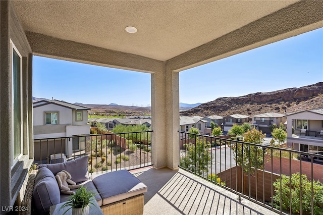 balcony featuring a mountain view