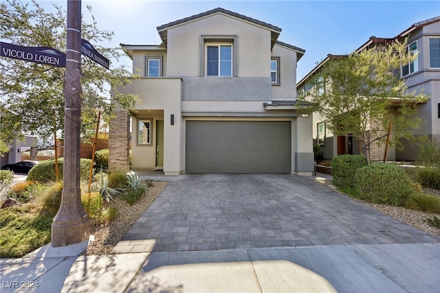 view of front of property with a garage