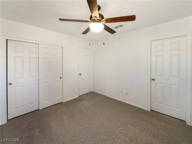 unfurnished bedroom with carpet and ceiling fan