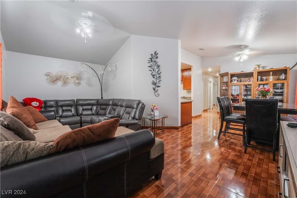 living room with ceiling fan