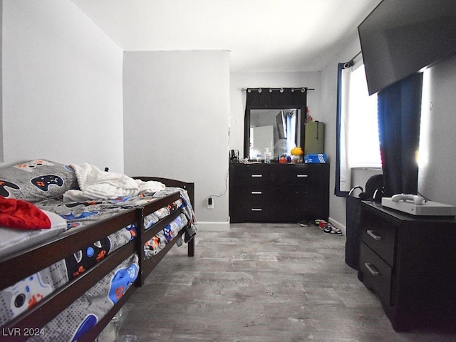 bedroom with wood-type flooring