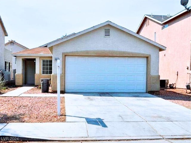 ranch-style home with a garage