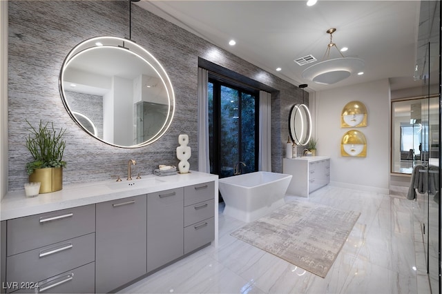 bathroom with a bathing tub and vanity