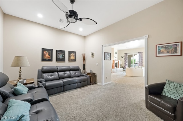 living room with carpet and ceiling fan