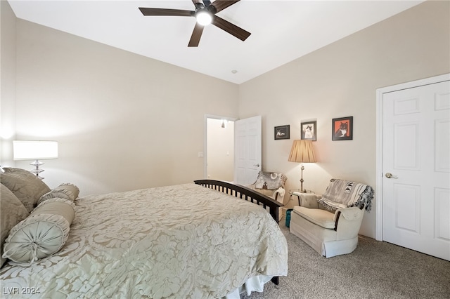 bedroom with light carpet and ceiling fan